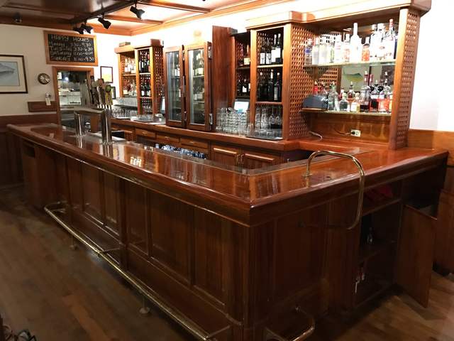 Stained wood bar in a restaurant