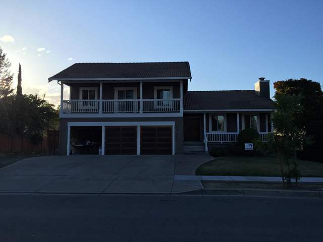 Two-story stucco home and garage