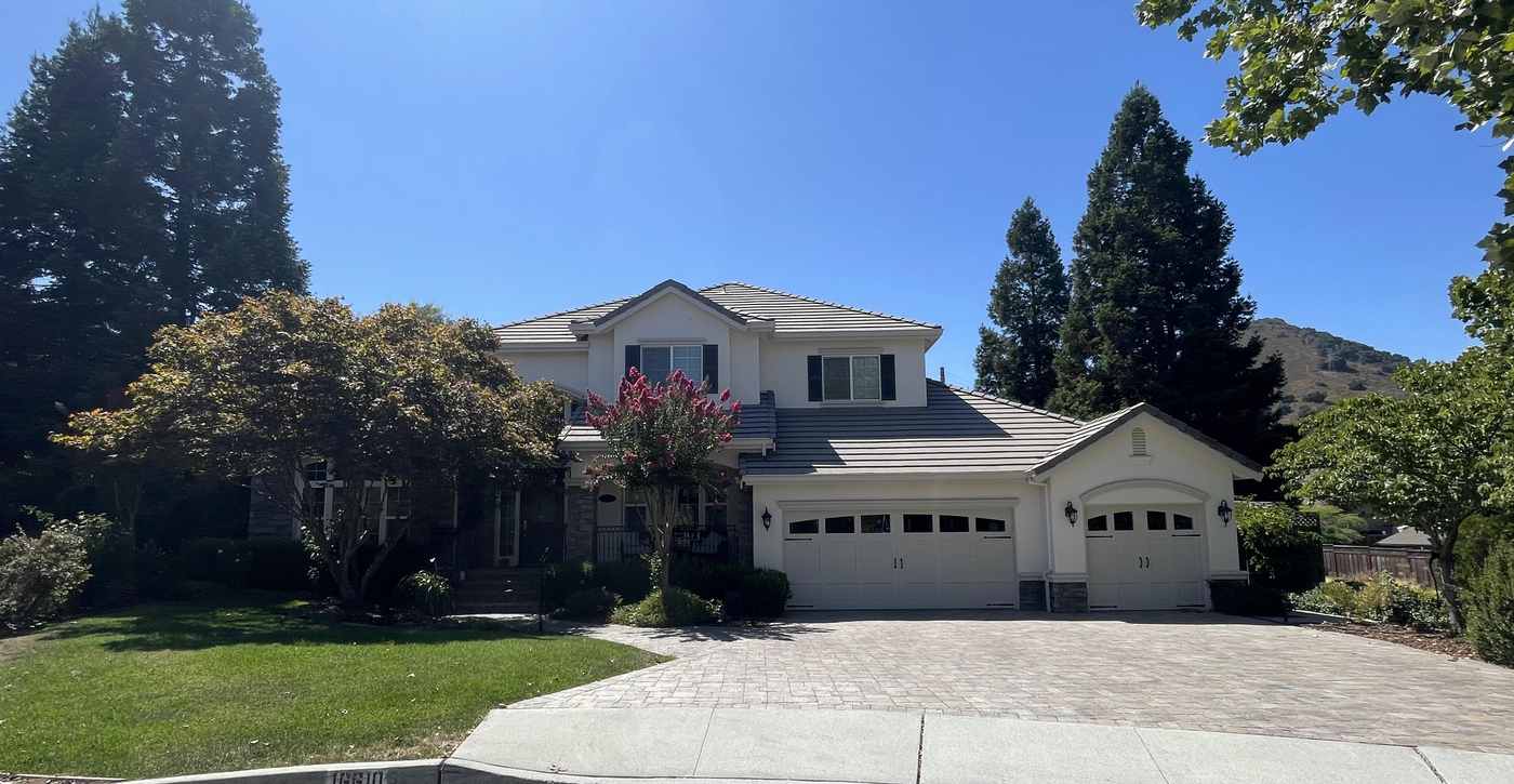 Two-story stucco home in Morgan Hill with a fresh exterior paint job